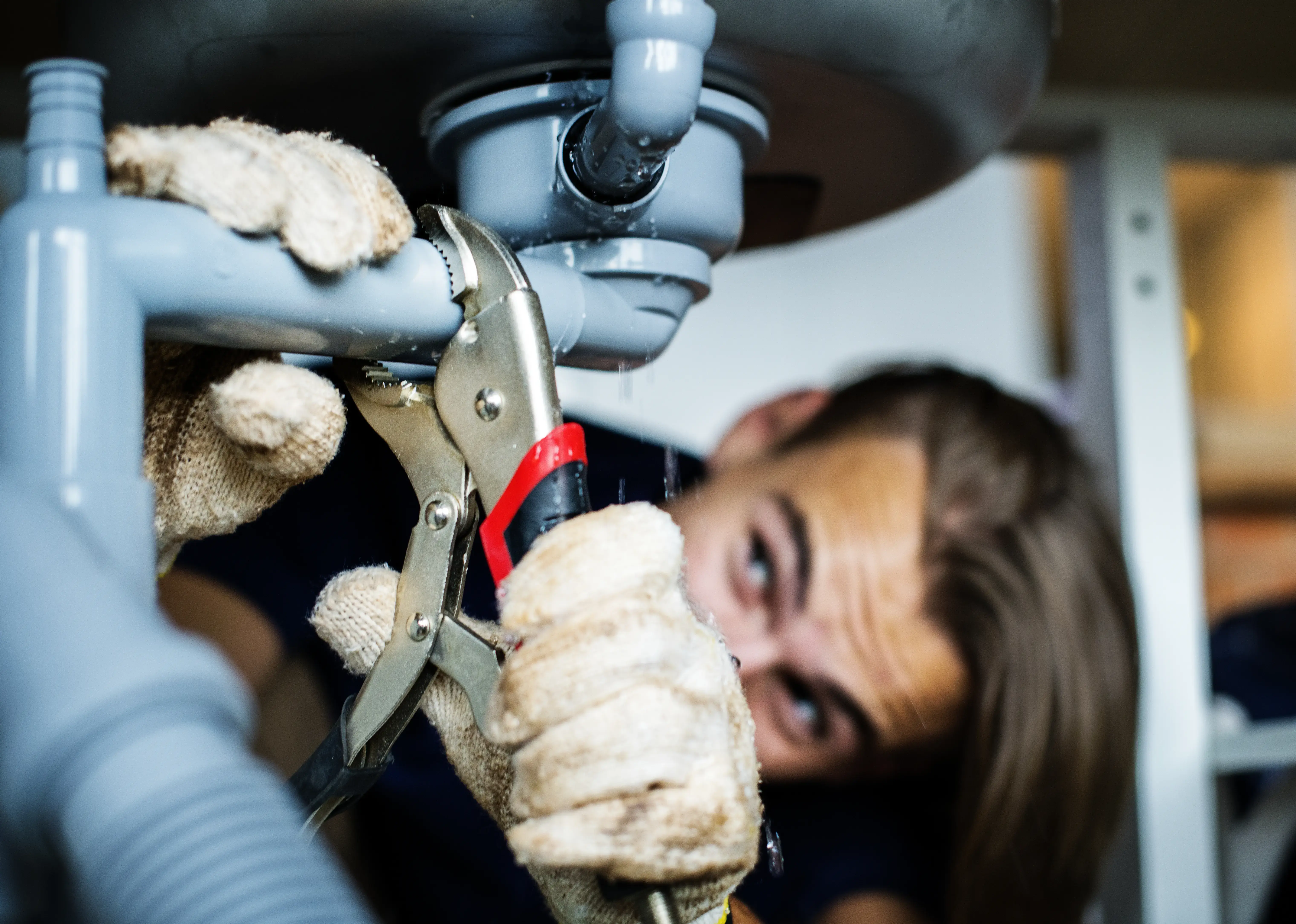 Plumber handling emergency residential or commercial plumbing issues