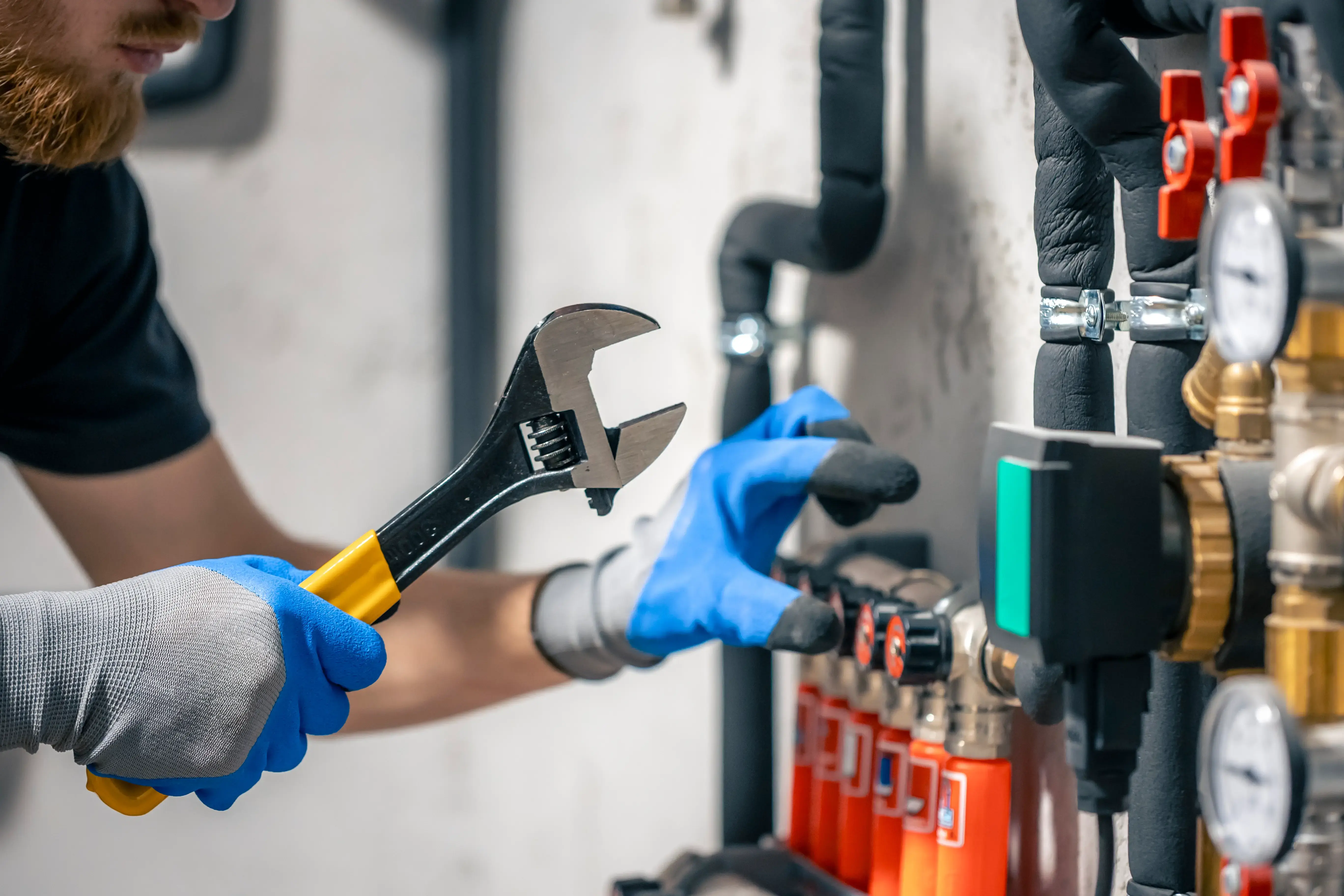 Professional plumbing services - expert technician working